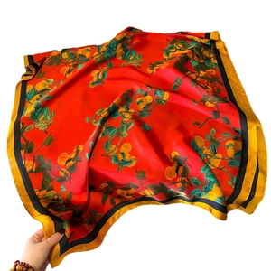Elegant Chinese silk scarf with red base, fruit prints, and contrast striped borders