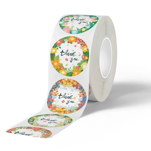 Roll of floral Thank You stickers with assorted colorful flower designs for wedding favors