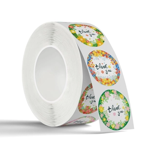 Roll of colorful floral Thank You stickers for wedding and birthday envelope sealing