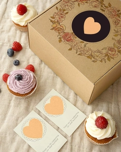 Brown kraft gift box set with floral wreath, heart seal stickers, and thank you cards