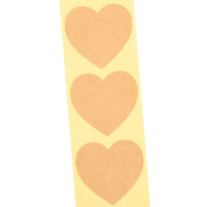 Natural brown kraft heart stickers for scrapbooking and gift tags on white background