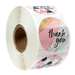 Close-up of 1-inch round Thank You stickers with pink, gold and polka dot geometric designs