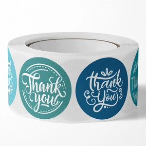 Roll of assorted blue Thank You stickers with elegant floral patterns for wedding favors