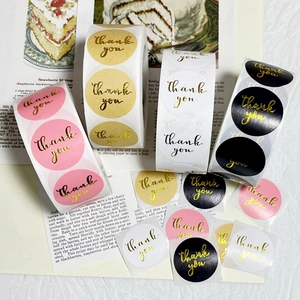 Pink and black round Thank You stickers with gold foil for gift sealing and packaging