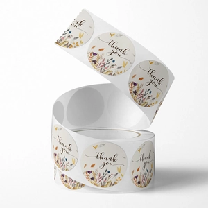 Roll of floral thank you stickers with colorful autumn blooms for gift packaging
