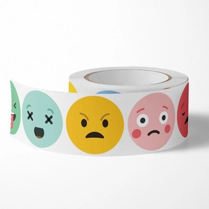 Roll of colorful cartoon emoji reward stickers for students with various fun expressions
