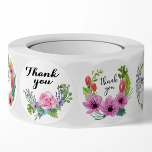 Rolle mit floralen Dankeschön-Aufklebern für Hochzeitsumschläge und Geschenkverpackungen