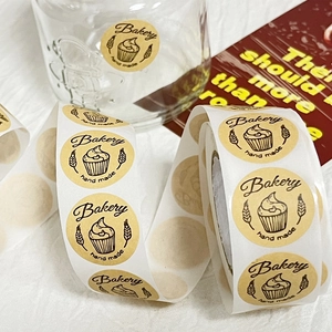 Kraft paper bakery labels featuring cupcakes and handmade text for cake packaging