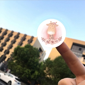 Cute round cartoon giraffe animal sticker with floral design for sealing labels
