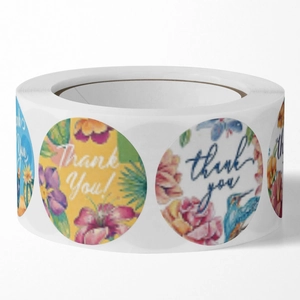Roll of 500 floral Thank You stickers with hummingbird and flower designs for packaging