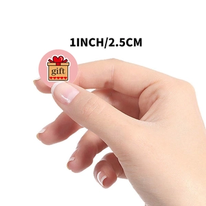 Pink round gift sealing sticker with heart box and 1 inch diameter size display