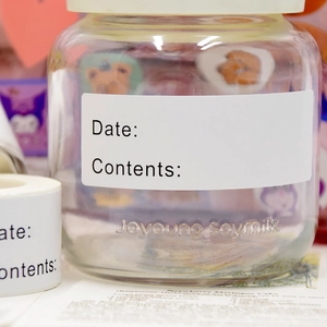 Blank adhesive food storage labels with date and content lines for pantry jars