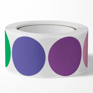 Colorful round blank stickers in rolls for handwriting, marking, and office organization