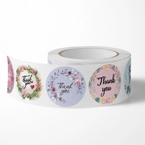 Floral Thank You roll stickers with diverse botanical patterns for gift packaging