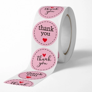 Pink round thank you roll stickers with red heart and dotted border for gift packaging