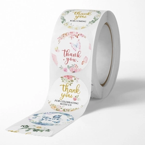 Floral thank you sticker roll with butterfly designs for gift sealing and decoration
