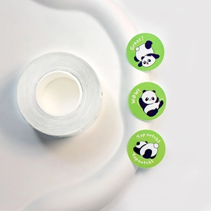 Roll of cute panda reward stickers featuring encouraging phrases like Great and Top notch