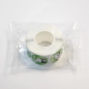 Roll of cartoon panda reward stickers with motivational English phrases for students