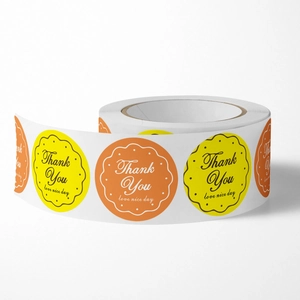 Rouleau d'autocollants Thank You floraux jaunes et oranges pour sceller des cadeaux