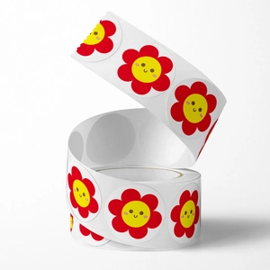 Roll of smiling sunflower reward stickers for kids with vibrant red petals and yellow centers