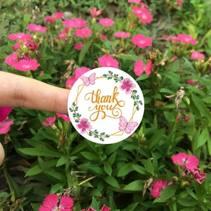 Floral round thank you stickers with butterfly design for wedding and party favors