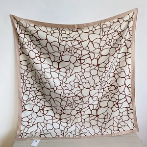 Abstract pattern silk-like square scarf in beige and brown with geometric lines