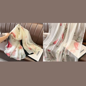 Lightweight cream shawl with large red tulip prints and elegant semi-sheer silk texture