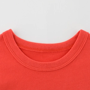 Classic red crewneck cotton T-shirt for boys featuring a ribbed collar and durable stitching
