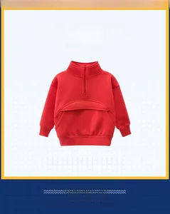 Detail of red children hoodie with half-zip, fleece fabric and CARRY chest print