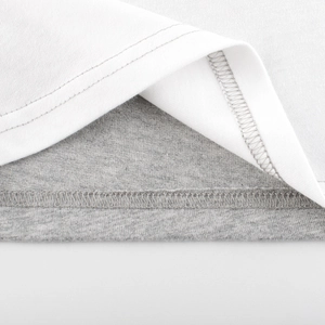 Boys long sleeve t-shirt featuring double-layered hem with precise overlock stitching detail