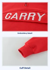 Detail of red toddler hoodie with white CARRY embroidery and ribbed elastic cuffs