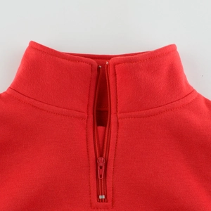 Kids red half-zip sweatshirt featuring a stand-up collar and smooth high-density fabric