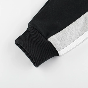 Pantalon de sport hiver pour garçons avec poignets côtelés et rayures contrastées