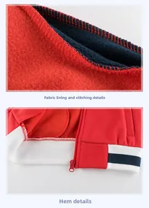 Detail of red kids jacket featuring navy fleece lining and striped ribbed hem design