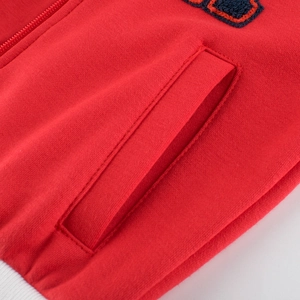 Red zip-up cotton sweatshirt for boys with side pockets and ribbed hem detail