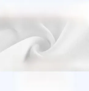 Close-up of white soft cotton knit fabric showing breathable and comfortable texture