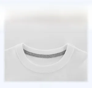 Close-up of the ribbed crew neckline and reinforced stitching on a white cotton kids' T-shirt