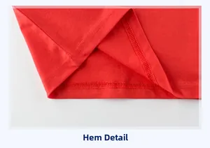 Detailed close-up of double-stitched hem on high-quality red cotton children's t-shirt