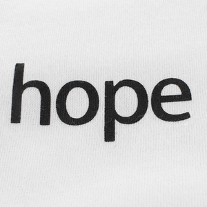 Kids white cotton short sleeve T-shirt with minimalist black hope print on the chest