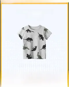 T-shirt grigia per bambini con sagome di dinosauri neri e dettaglio del tessuto morbido