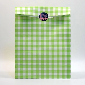 Green and white checkered gift bag with a round Thank You bow sealing sticker