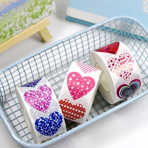 Roll of heart shaped thank you stickers for wedding and birthday gift decoration