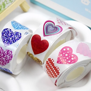 Roll of red heart and star decorative stickers for wedding gift packaging labels
