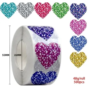 Detail of multi-color heart-shaped glitter stickers roll for wedding and gift decoration