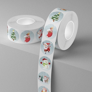 Blue Christmas gift label stickers on a roll featuring Santa, snowman and festive trees