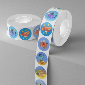 Roll of cartoon sea animal reward stickers with colorful aquatic character designs
