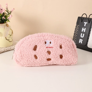 Detail of pink plush pencil case featuring a cute cookie embroidery and smooth metal zipper