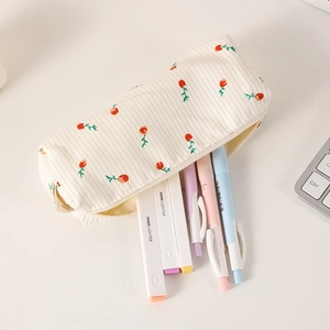 Floral corduroy pencil case detail with tulips showing stationery storage capacity