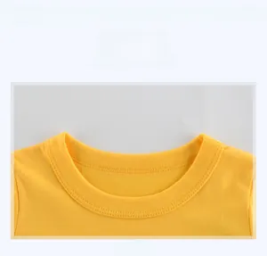 Detail view of the yellow cotton t-shirt showing the ribbed crew neck and double stitching