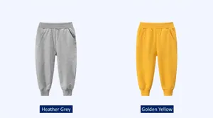 Detailed close-up of cotton sweatpants in heather grey and golden yellow colors
